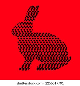 Vector side view of a rabbit with dot design, pop art single pattern rabbit, black on red.