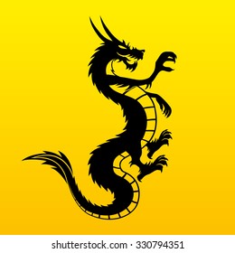 Vector sign. Black dragon isolated on yellow background.
