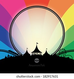 Vector silhouette of amusement park with rainbow background