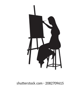 Vector silhouette in black color of a girl draws on an easel