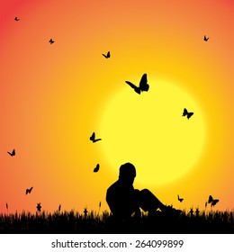 Vector silhouette of a boy with butterflies.