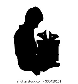 Vector silhouette of a boy with a gift.