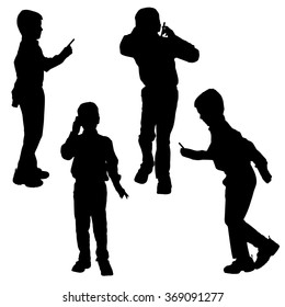 Vector silhouette of a boy with a mobile phone.