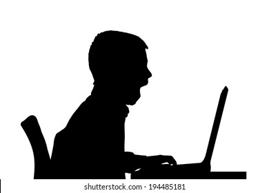Vector silhouette of a boy sitting at a computer on a white background.