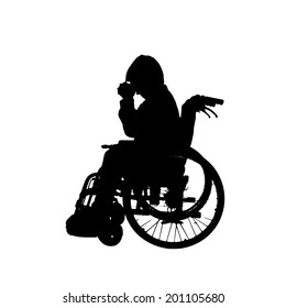 Vector silhouette of a boy in a wheelchair.