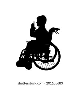 Vector silhouette of a boy in a wheelchair.