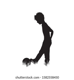 Vector silhouette of boy who play football in the grass on white background. Symbol of boy, alone, play, game, ball, soccer, infant, childhood, nature, park, garden.