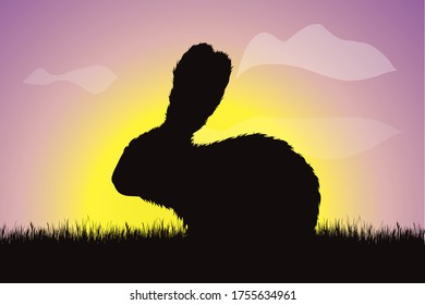Vector silhouette of bunny in the grass at sunset. Symbol of farm.