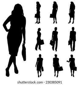 Vector silhouette of a businesswoman on a white background.