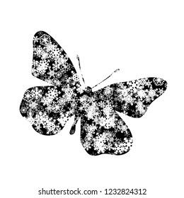 Vector silhouette of butterfly with snowflakes.