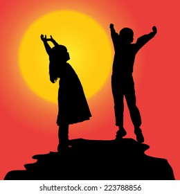 Vector silhouette of a children at sunset.