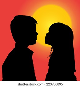Vector silhouette of a children at sunset.