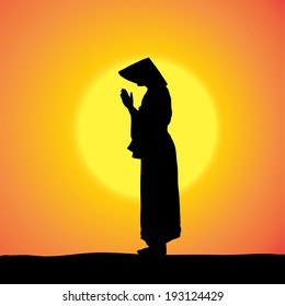 Vector silhouette of Chinese with hat at sunset. 