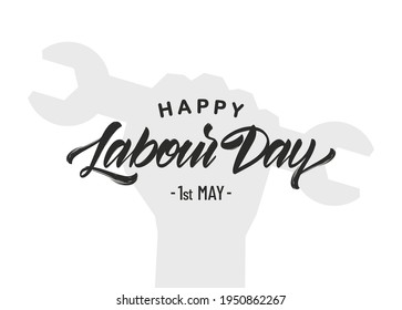 Vector silhouette of clenched fist with wrench, hand lettering of Happy Labour Day 1st of May