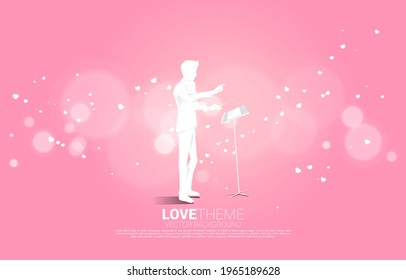 Vector silhouette of conductor standing with heart  flying . Concept background for love song and concert theme.