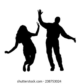 Vector silhouette of couple dancing on a white background.