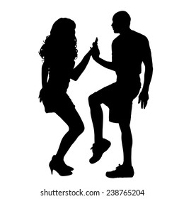Vector silhouette of couple dancing on a white background.