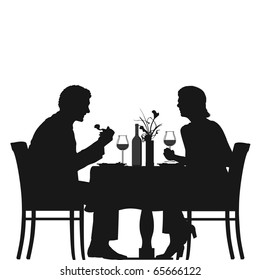 vector silhouette of a couple dining in a restaurant an drinking wine