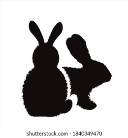 Silueta vectorial de un par de conejos sobre fondo blanco. Símbolo de animal forestal y liebre.