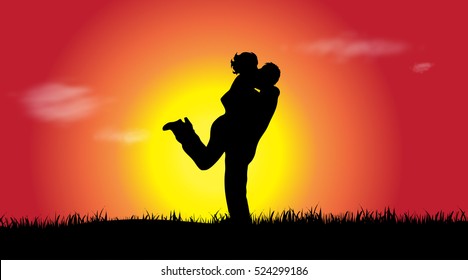 Vector silhouette of a couple at sunset.