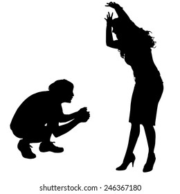 Vector silhouette of couple who argues on a white background.