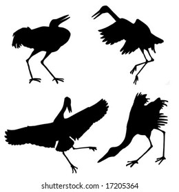 vector silhouette of the cranes isolated on white background