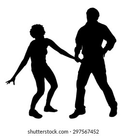 Vector silhouette of a dancing couple on a white background.