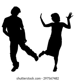 Vector silhouette of a dancing couple on a white background.