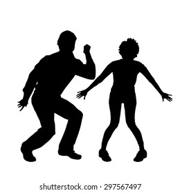 Vector silhouette of a dancing couple on a white background.