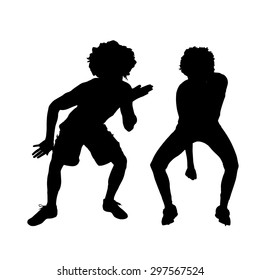 Vector silhouette of a dancing couple on a white background.