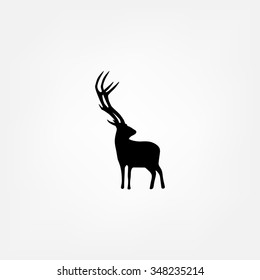 Vector silhouette of the deer isolated on white background