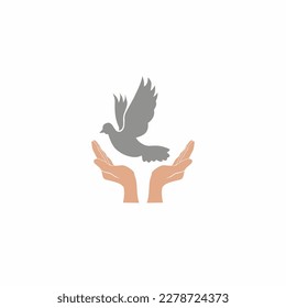 Vector silhouette design illustration of a hand releasing a dove as a sign or symbol of freedom