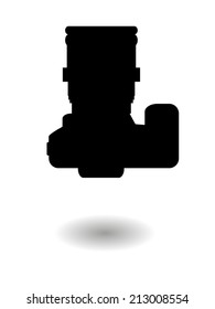 Vector silhouette of a digital SLR camera and a shadow on a white background