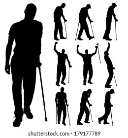 Vector silhouette of disabled people on a white background. 