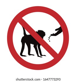 Vector silhouette of do not feeding monkey mark on white background. Symbol of prohibition.