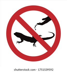 Vector silhouette of do not feeding lizard mark on white background. Symbol of prohibition.