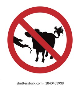 Vector silhouette of do not feeding cow mark on white background. Symbol of prohibition with animal.