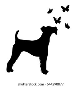 Vector silhouette of dog with butterfly on white background.