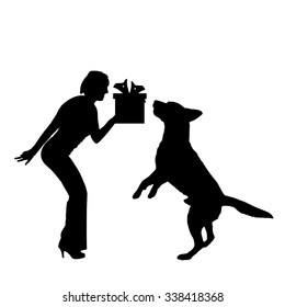 Vector silhouette of a dog with a gift.
