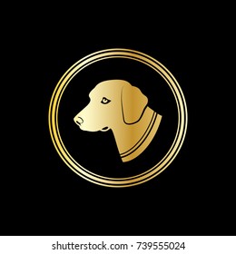 Vector silhouette of a dog head in gold circle. Symbol of 2018