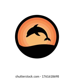 vector silhouette of a dolphin jumping in the middle of the sea at sunset

