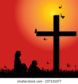 Vector silhouette family at the cross at sunset.