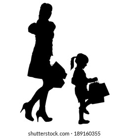 Vector silhouette of a family with shopping bags.