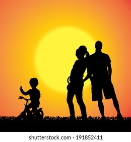 Vector silhouette of a family that is out at sunset. 