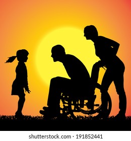 Vector silhouette of a family that is out at sunset. 