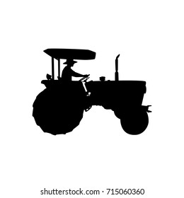 Vector silhouette of farmer on tractor. Isolated vector on white background.