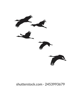 Vector silhouette flock of birds in flight isolated white background