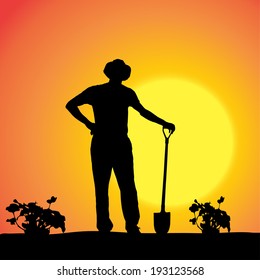 Vector silhouette of a gardener in the garden at sunset.