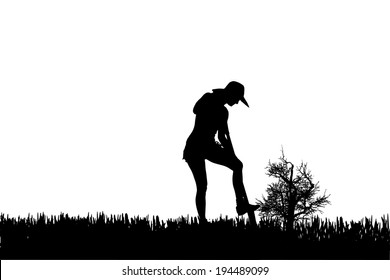 Vector silhouette of a gardener on white background. 