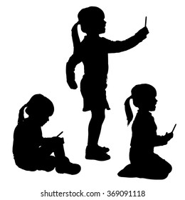 Vector silhouette of a girl with a mobile phone.
